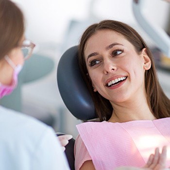 Smiling woman in dental chair