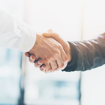 Two people shaking hands