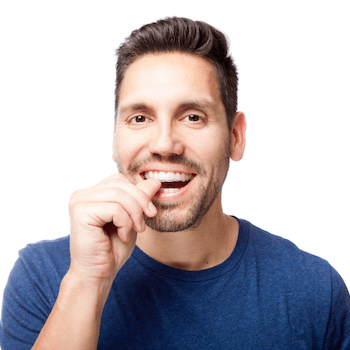  Man placing Invisalign tray