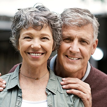 Smiling older man and woman