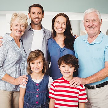 Three generations of family smiling together