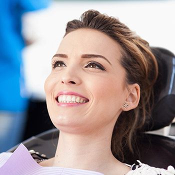 Smiling woman in dental chair