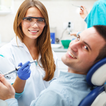 Smiling man in dental chair