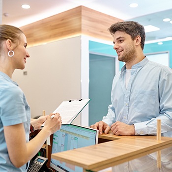 a man asking about the cost of veneers in Dallas