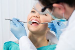 Woman getting a dental checkup