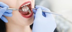 Woman getting a dental exam