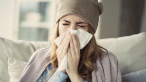 Woman suffering from cold