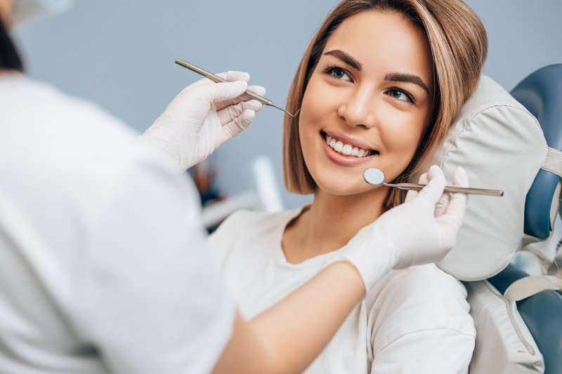 patient smiling during dental checkup