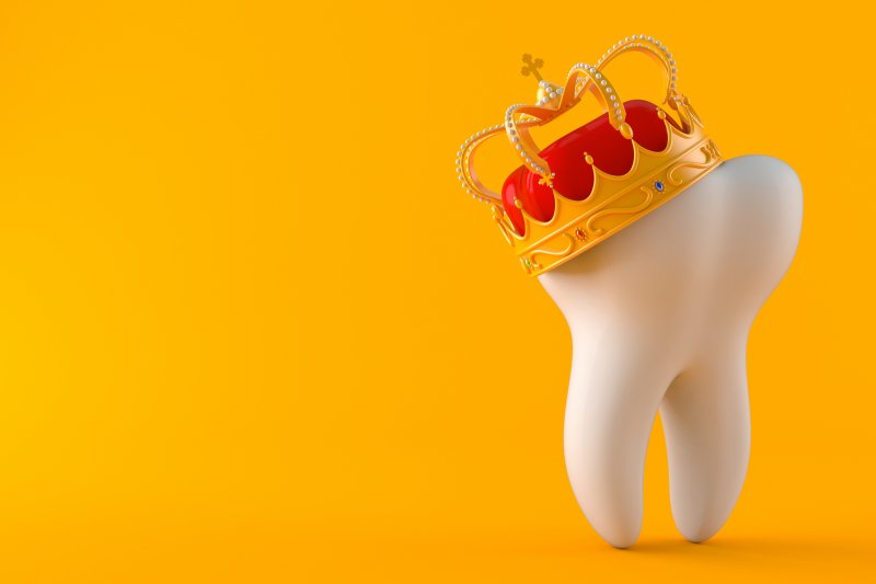 a model of a tooth with a crown in Dallas
