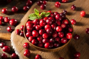 a bowl full of cranberries